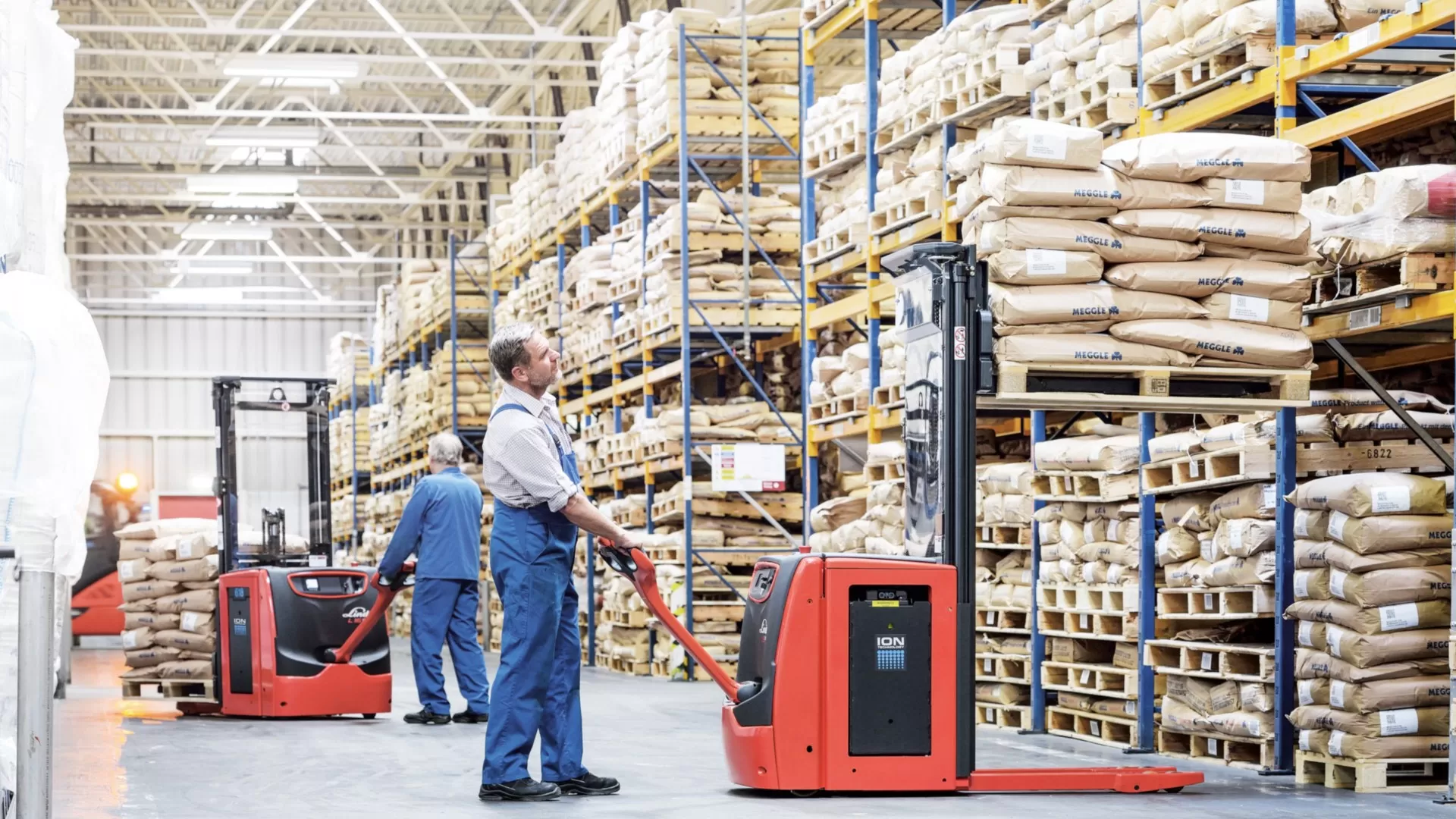 Material Handler In Production Manufacturing Material Handling Solutions